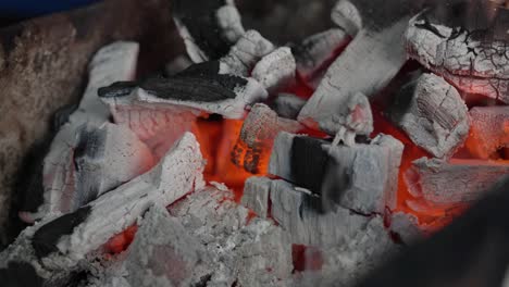 smoky red charcoal embers, ready for cooking