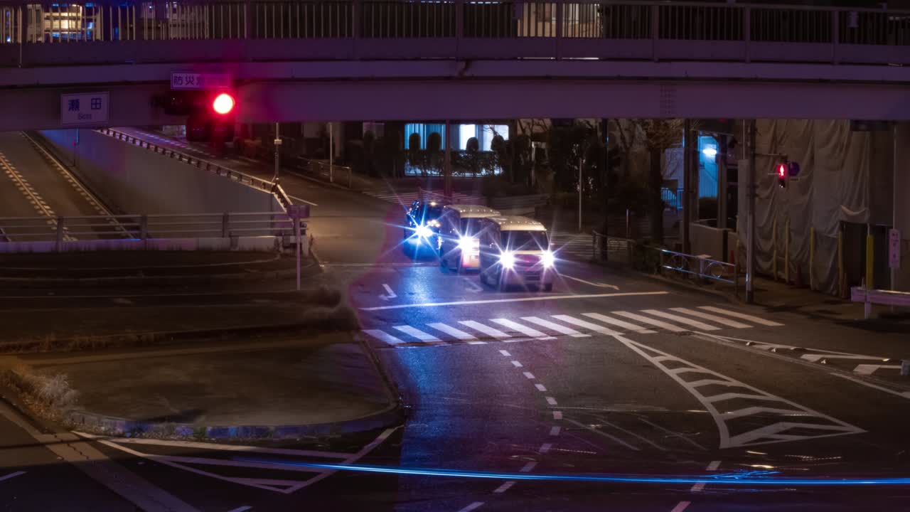 도쿄 시내 거리의 교통체증의 야간 타임스