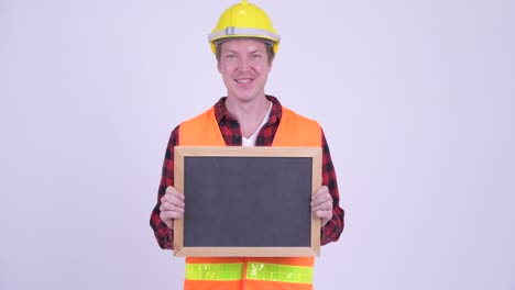 joven hombre guapo trabajador de la construcción