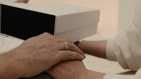 couple holding hands, gift