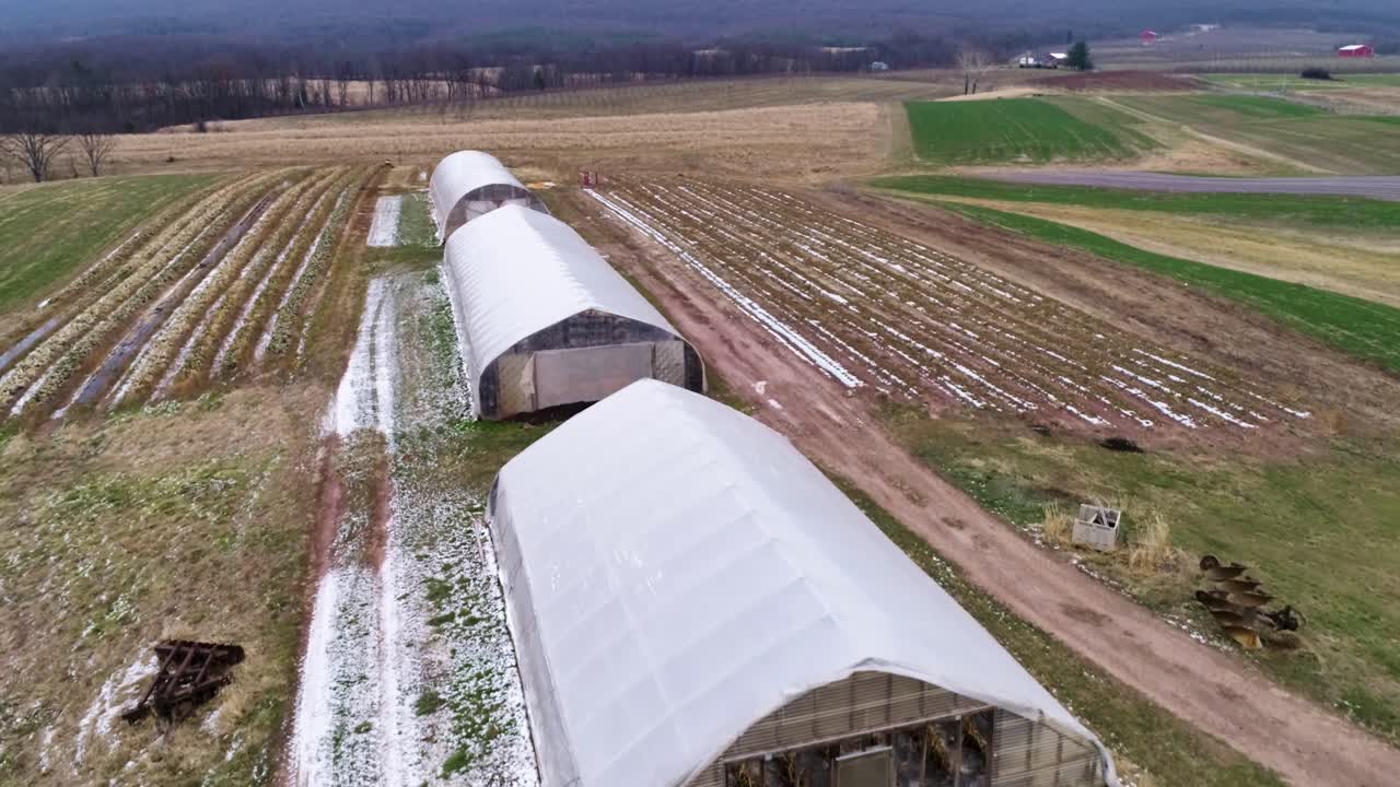 Aerial View of Greenhouses in a Rural Landscape
