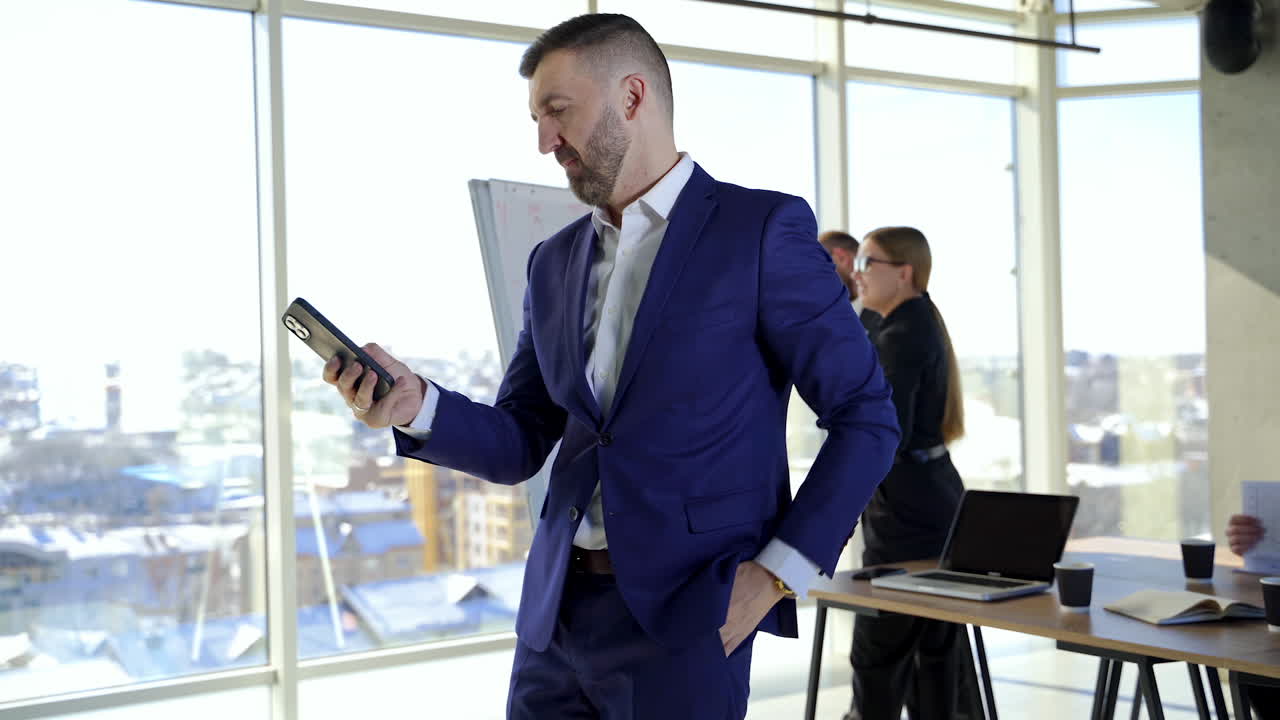 Successful business meeting. Handsome man in front view.