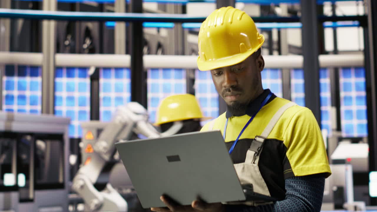 Vertical video Engineer in smart factory implementing renewable energy solutions