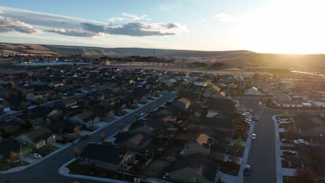 Aerial-shot-of-a-suburban-neighborhood-in-Eastern-Washington-at-sunset