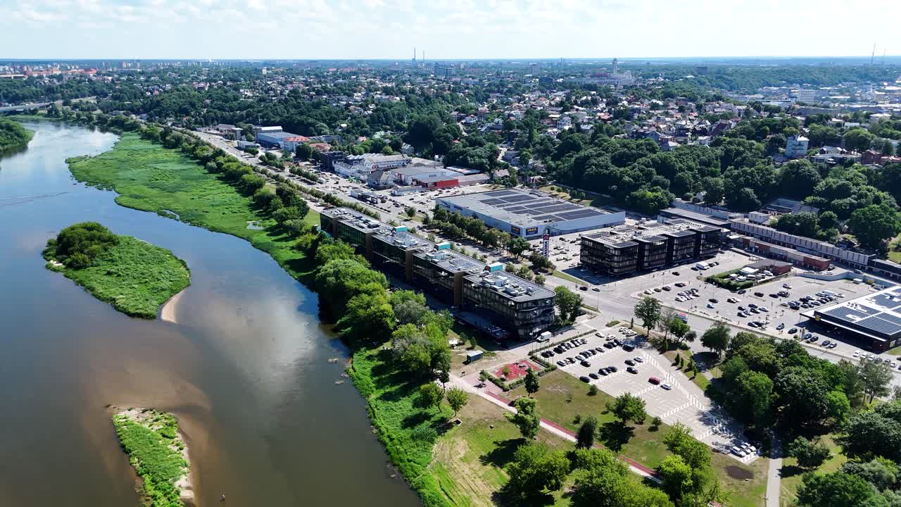 Neris River and Kauno Dokas office center, aerial drone view