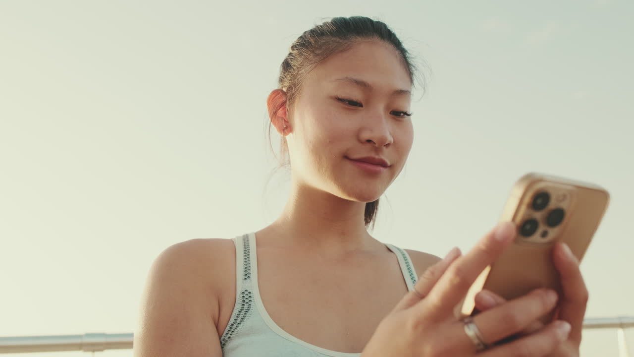 Asian woman using phone