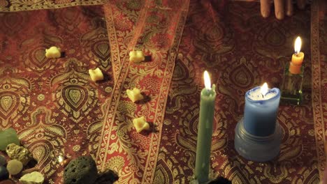 Close-up-of-a-fortune-telling-spread-with-lucky-vertebrae-bones-in-a-mystic-fortune-teller's-office