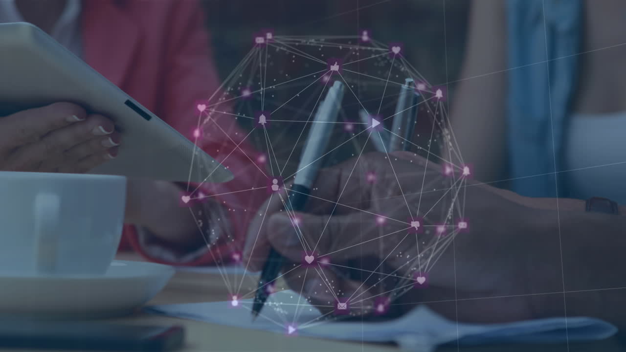 Global networking concept shown through a globe animation over colleagues in an office.