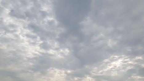 Mid-afternoon-thunderstorm-rain-clouds-forming-and-blending-across-the-african-horizon-time-lapse,-noise-free-4k-footage