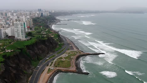 Ernesto-Aramburú-Menchaca-Park-seen-from-above,-south-america-skyline-view