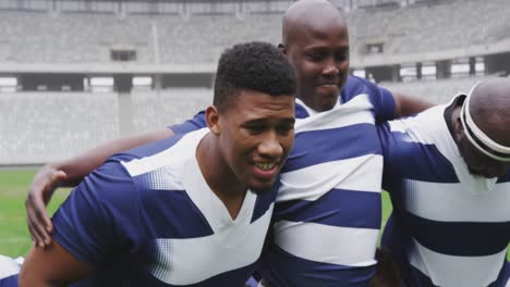 male rugby players playing rugby match in stadium 4k