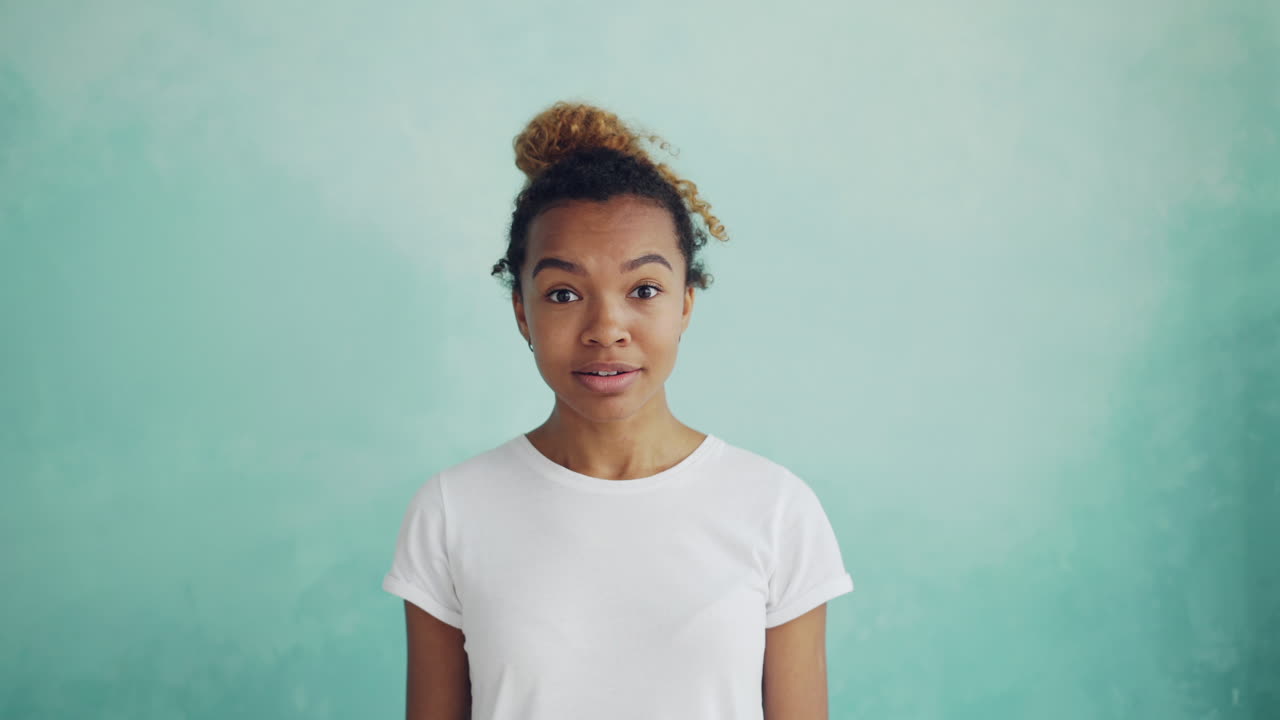Teenage girl with a surprised expression
