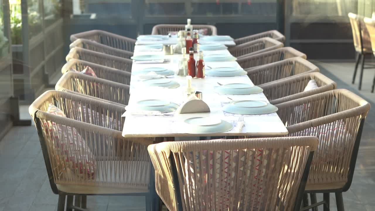 Front view of chairs for dining table in restaurant close up shot