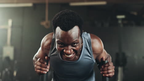 black man at gym, weight sled