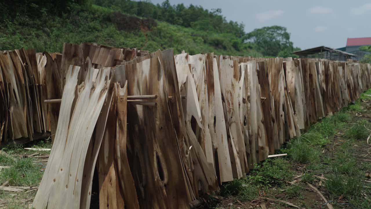 Drying Wood Planks in a Rural Setting