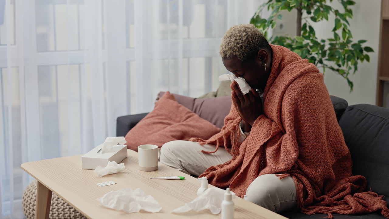 Sick woman resting on a couch