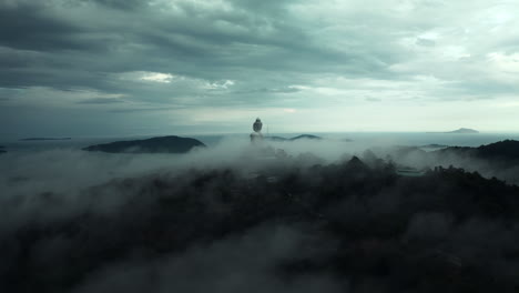 majestic buddha statue covered in mist