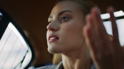 aggressive businesswoman arguing at backseat. girl talking with unknown person