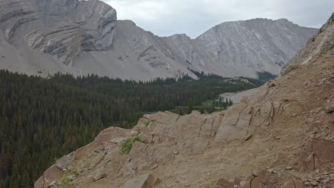 Hikers-in-the-mountain-trail-valley-followed-Kananaskis-Alberta-Canada