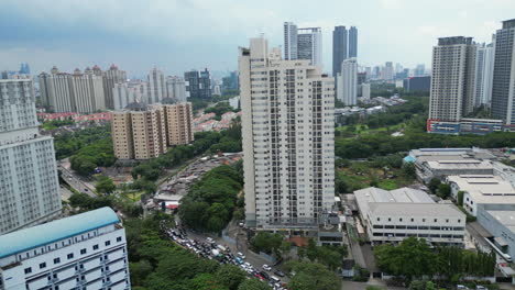 old jakarta apartment building overlooking sunter lake slow track in