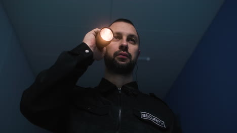 Man-in-uniform-working-on-the-corridor