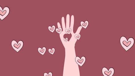 animation of hearts and hand over pink background