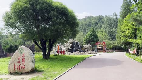 serene chinese park with mountain view and great wall glimpse