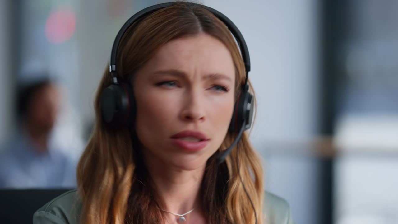 Help desk woman headset explaining problem solution to client in office closeup