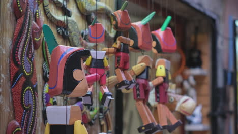 colorful wooden puppets on display