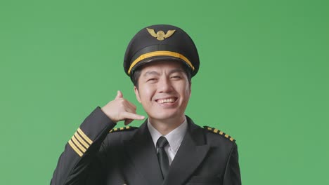 pilot making a call gesture