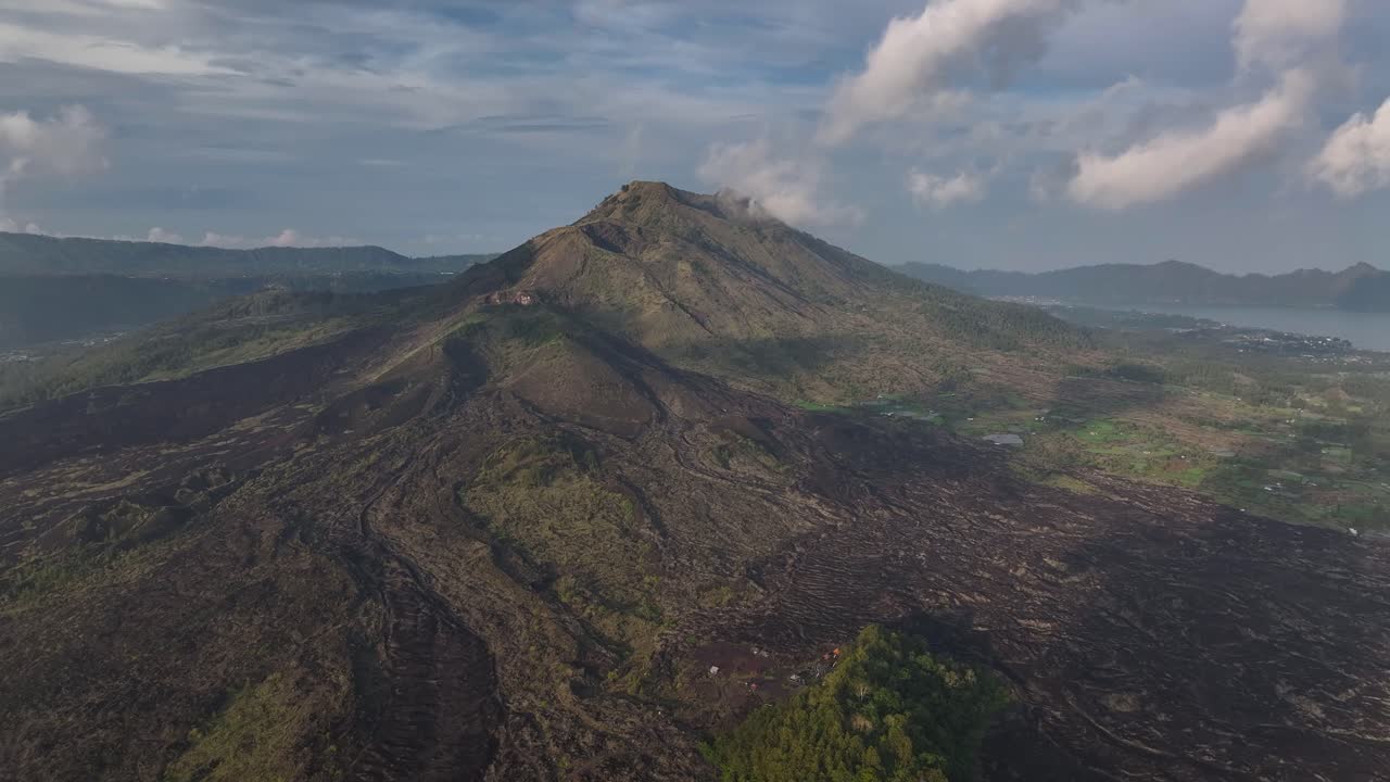 Mount Batur volcano in Kintamani, Bali, Indonesia. Aerial volcanic landscape, landmark.