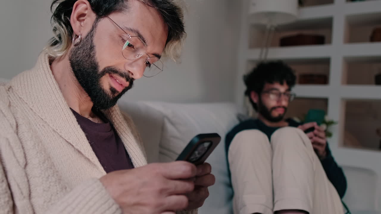 Gay Couple Relaxing at Home Together