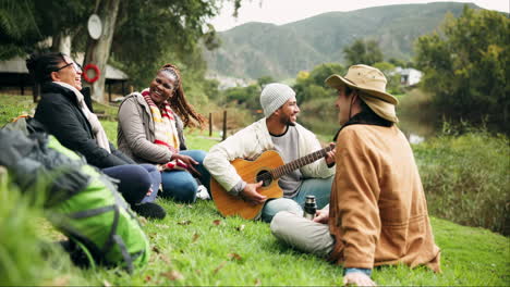 Fun,-guitar-and-friends-camping-in-nature