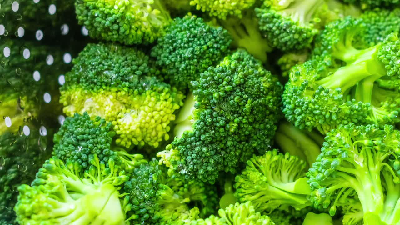 Zoom in on a broccoli in a sieve