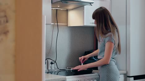 young mother preparing the food