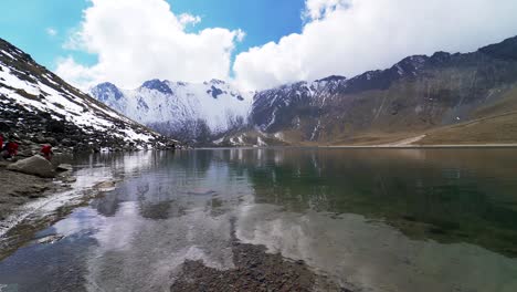 A-nice-view-of-the-main-lagoon,-sun-lagoon-in-the-crater-of-the-nevado-de-toluca-volcano-also-called-xinantecatl-which-is-rarely-this-snowy