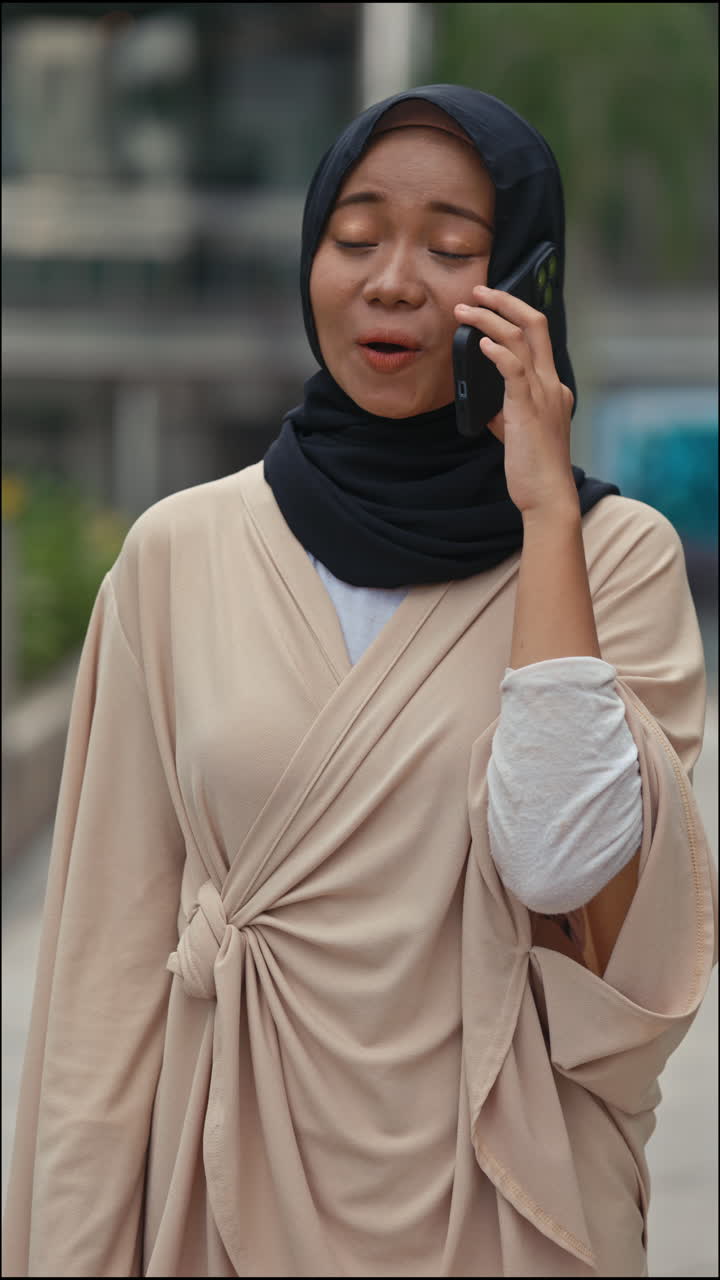 Young Woman Communicating on Smartphone with Expressive Reactions