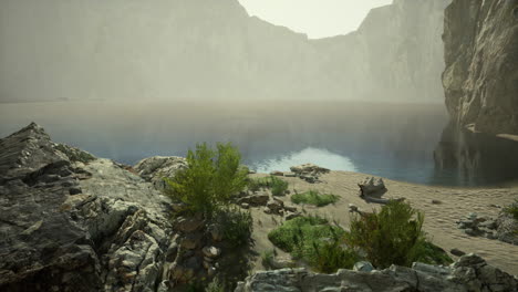 un lago de niebla rodeado de altos acantilados