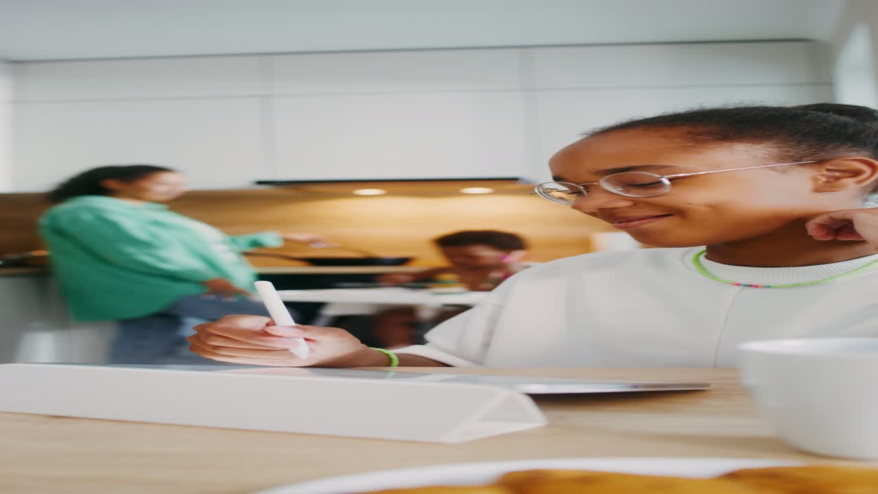 Girl Studying at Kitchen Table
