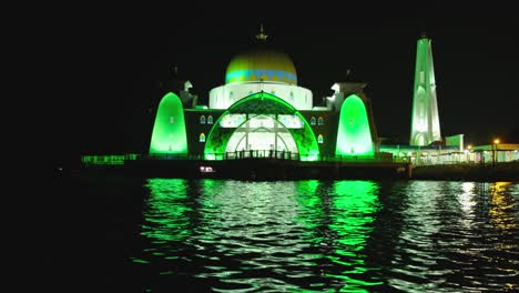 this video is about a mosque inside a sea of malaysia (malacca). what make this mosque special is the fact of the wonderful sunset and the green light come in from the mosque.