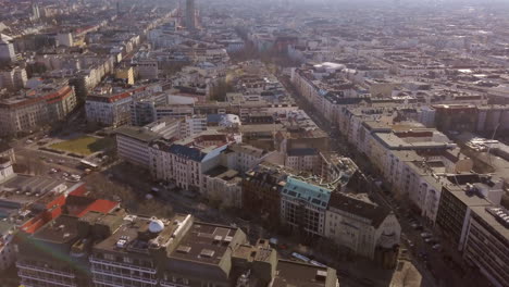 Drone-flight-over-the-campus-of-the-Technical-University-of-Berlin-with-a-view-of-the-Tiergarten,-Bahnhof-Zoo,-Straße-des-17