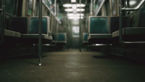 inside of the old non-modernized subway car in usa