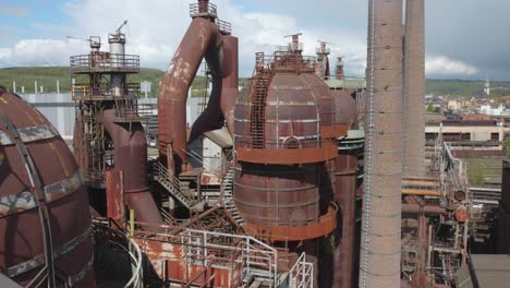 abandoned rusty industrial blast furnace complex