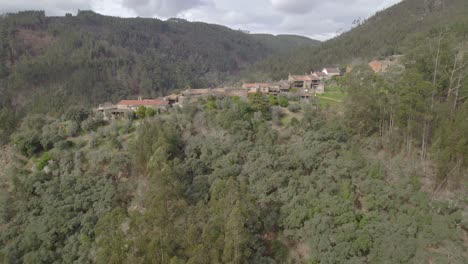 Aerial-approach-to-the-Schist-Village---a-unique-architectural-ancient-stone-houses-of-the-Casal-de-São-Simão