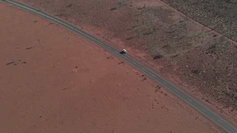 camper van parked on the roadside. uluru road in northern territory, australia. aerial drone