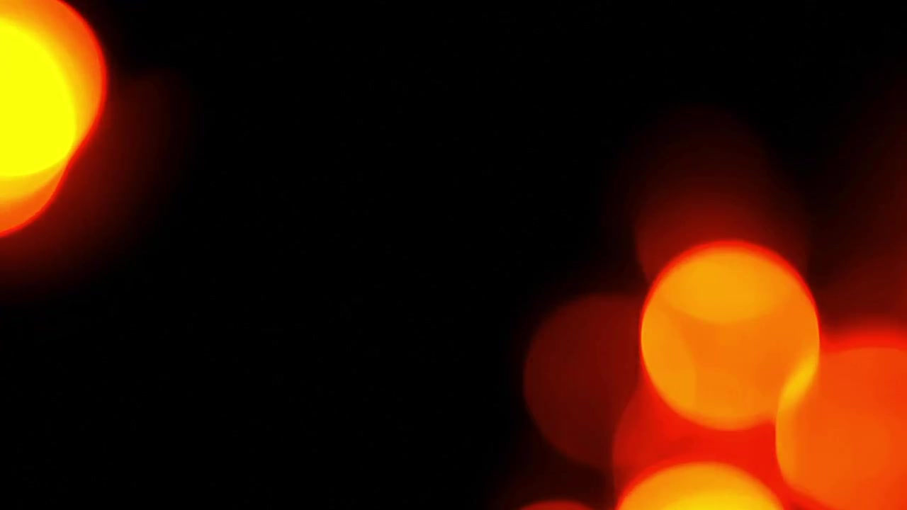 Abstract Background of Glowing Red and Orange Bokeh Lights