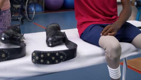 man exercising with prosthetic legs