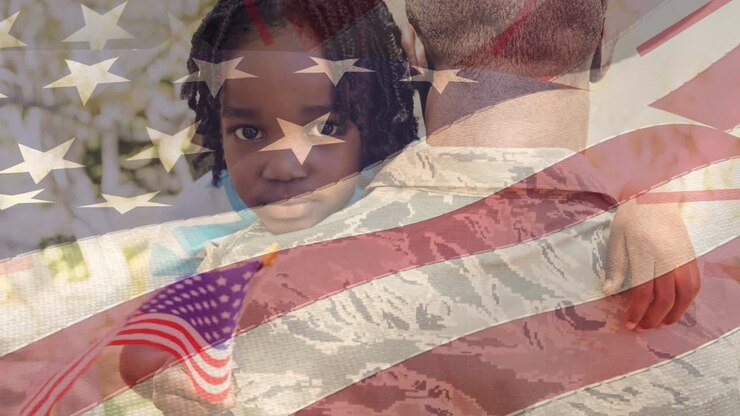 Animation of flag of america blowing over african american daughter with flag hugging soldier father