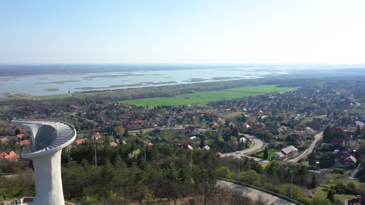 Viewpoint on the top of the hill. View to the lake Velencei, HungaryDrone moves slowly up