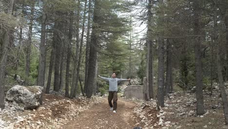 Man-Trekking--on-Dirt-Road